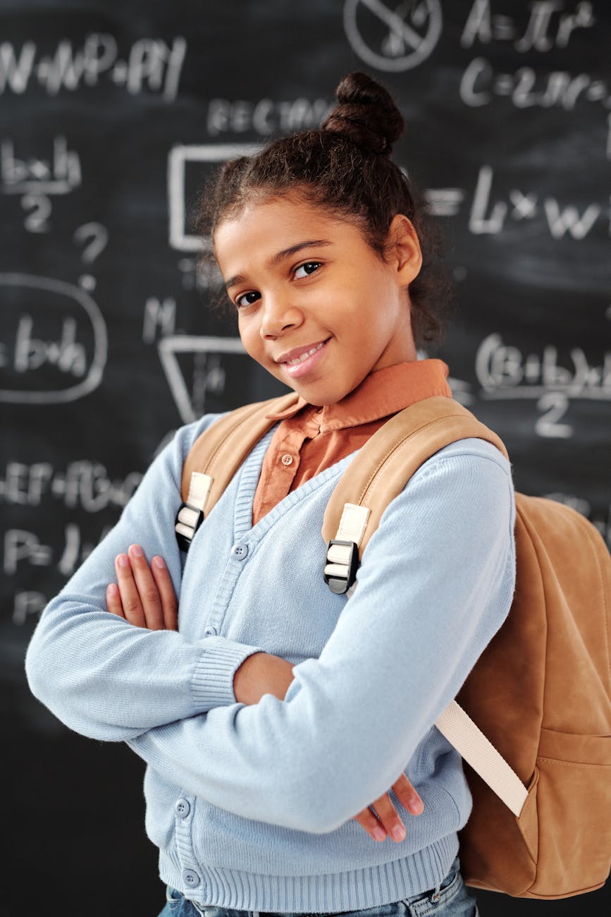 A confident student with a backpack.