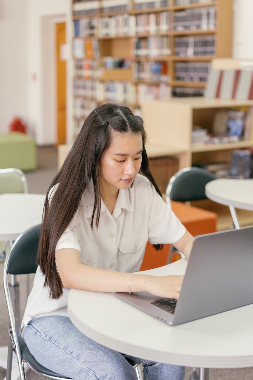 A student reading in a library.